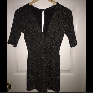 Black with gold sparkles one piece romper